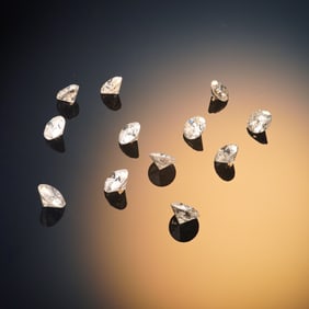 12 Loose Round Brilliant Cut Diamonds