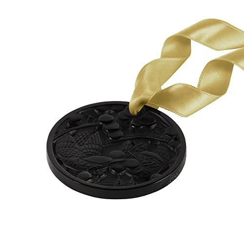 Lalique Crystal Merles Raisins Black Christmas Ornament: This striking Lalique Merles Raisins ornament, crafted in black crystal, features an intricate design of birds and berries. The ornament comes with a gold satin ribbon for elegant display or hanging. 