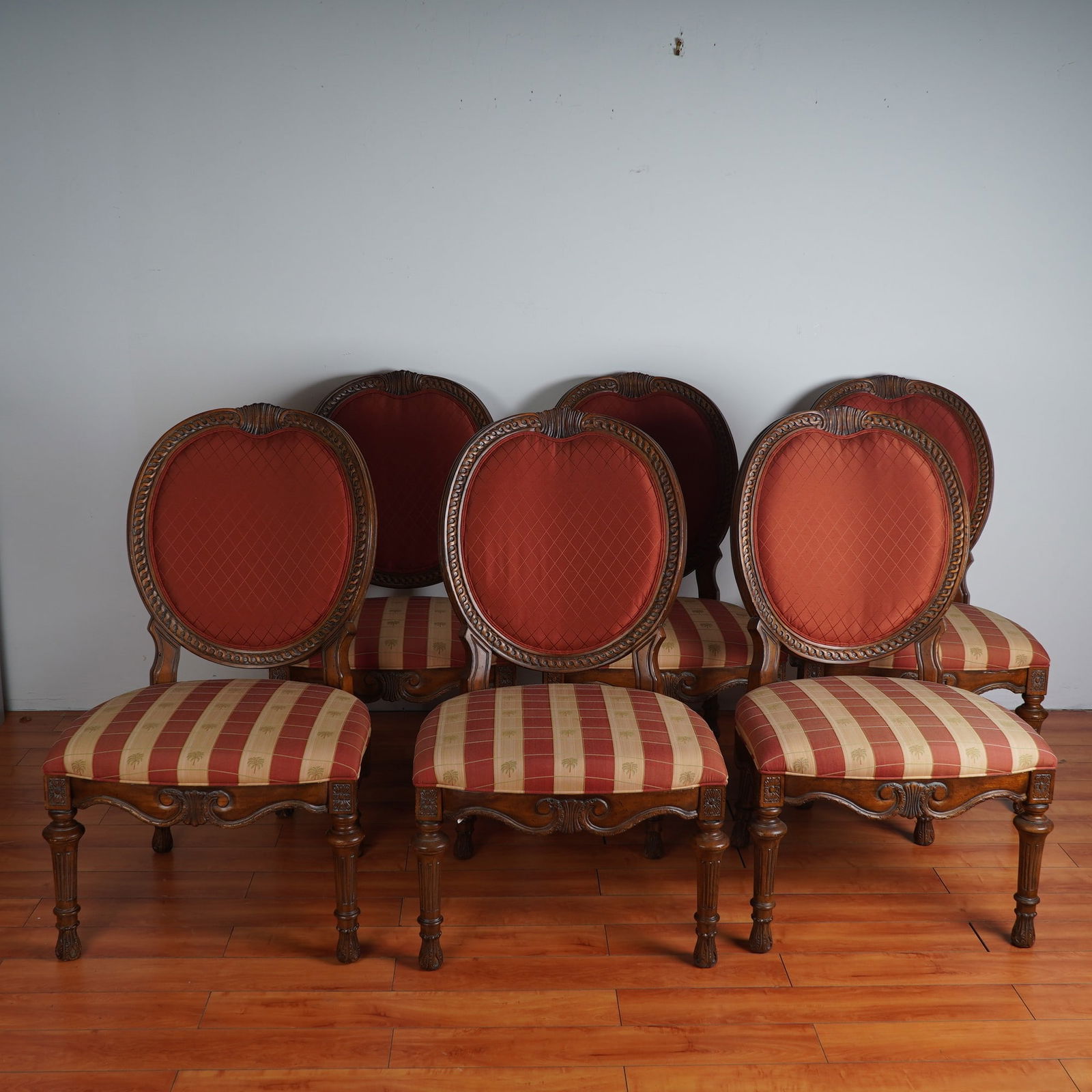 Set of 6 Drexel Heritage Talavera Dining Chairs w/ Palm Tree Motif: A handsome set of six carved side chairs in the Talavera style by Drexel Heritage Furnishings, Morganton, North Carolina, dated 2006. Each chair features an intricately carved wood frame with a rich,