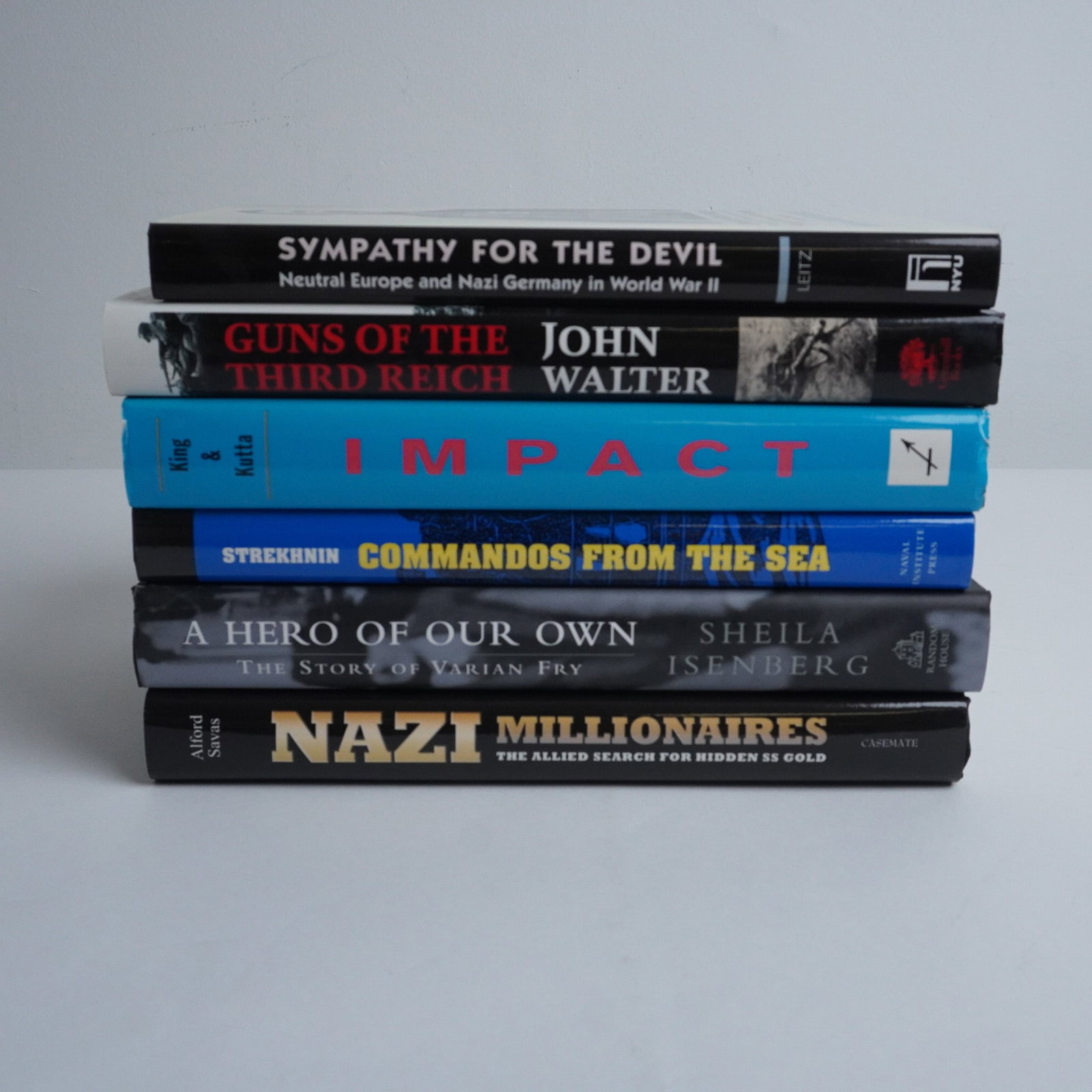 6pc Hardcover Books on WWII History and Nazi Germany: This lot features six hardcover books covering various aspects of World War II history, Nazi Germany, and military operations. Impact by King & Kutta explores strategic bombing and its effects during 
