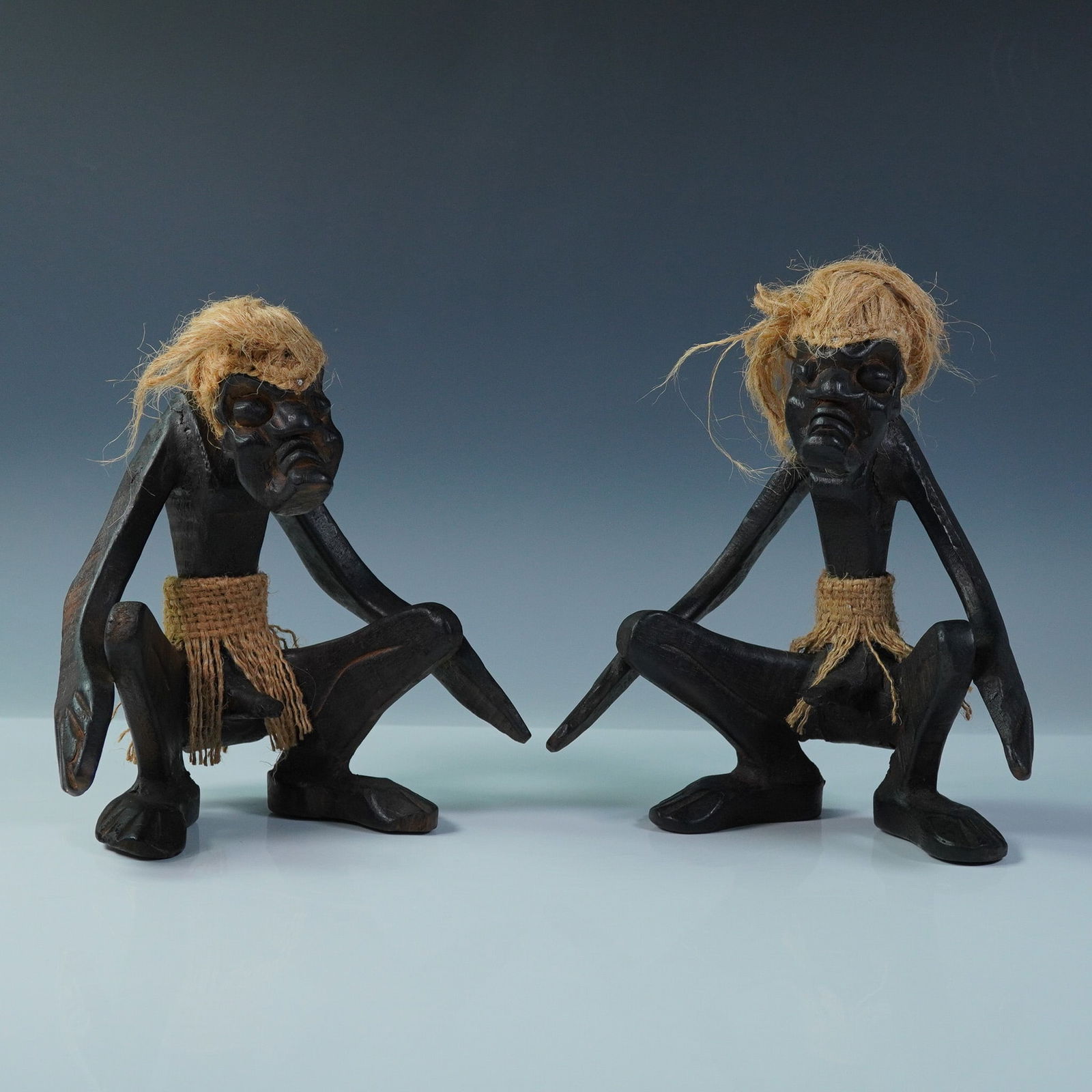 Pair of Southeast Asian Hardwood Crouching Men Figures (1 of 5)