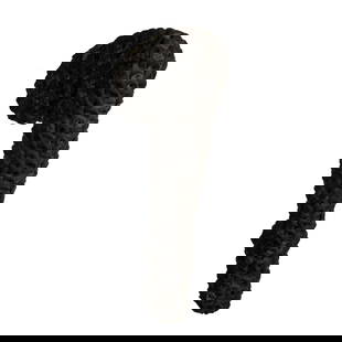 Conceptual Art Black Foam Covered Mannequin Leg: Conceptual art piece that features a mannequin leg covered entirely with black foam pieces that have been drilled to form a continuous pattern. This outrageous piece includes a hook to attach to a wal