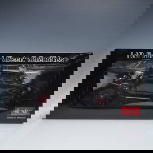 Sun Star 1:18 Die-Cast Model Car, 1931 Ford Model A Coupe: Highly detailed 1:18 scale die-cast model of a 1931 Ford Model A Coupe by Sun Star. Features include a black body with red spoked wheels, chrome accents, and opening components. Produced for adult col