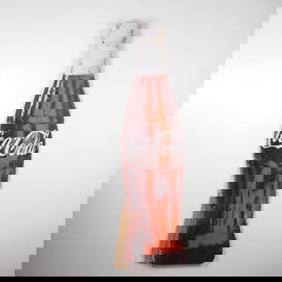 Coca-Cola Bottle-Shaped Cardboard Standee: Oversized Coca-Cola advertising standee in the shape of the iconic glass bottle, featuring high-resolution condensation graphics and white script logo. Made of folded cardboard with integrated support