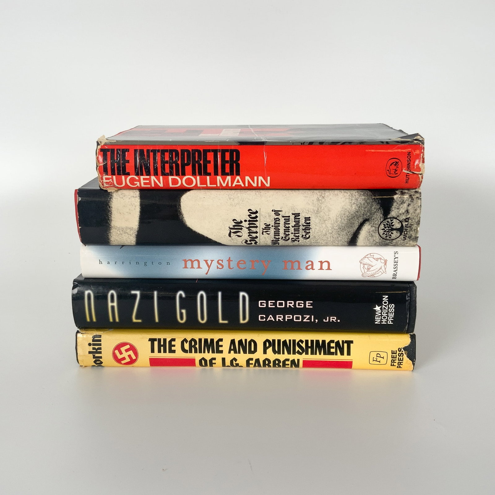 5 Books on Nazi Germany, Espionage, and War Crimes: This collection of five books explores various aspects of Nazi Germany, war crimes, espionage, and post-war intelligence. Included are The Crime and Punishment of I.G. Farben by Joseph Borkin, detaili