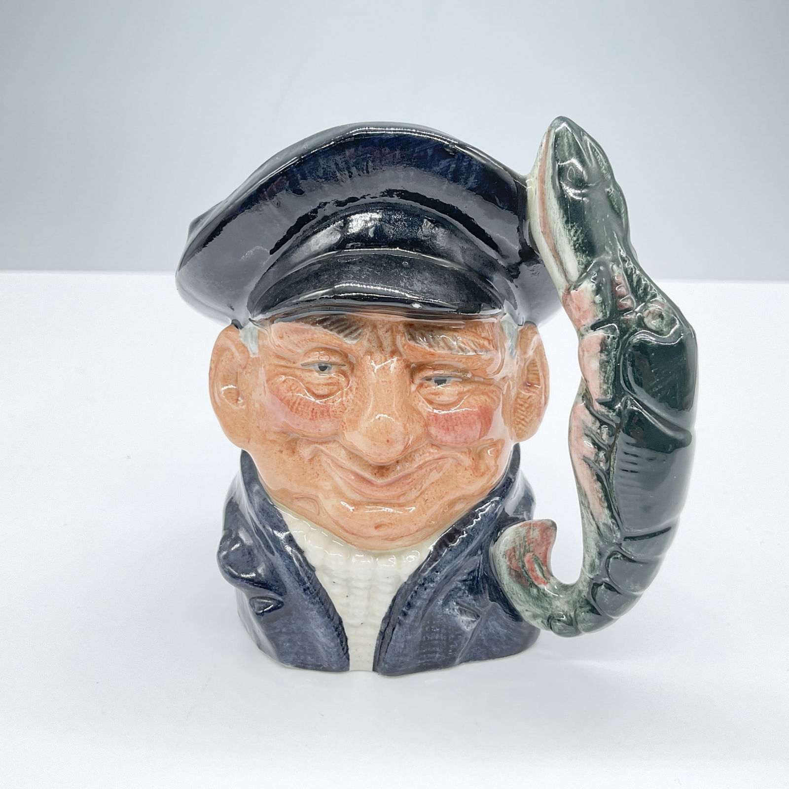 Lobsterman D6620 - Small - Royal Doulton Character Jug: Royal Doulton backstamp. Artist: David B. Biggs Issued: 1968 - 1991 Dimensions: 3.75"H Country of Origin: England