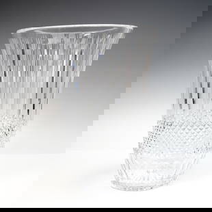 Cut Crystal Vase with Starburst Base: Elegant cut crystal vase featuring a flared rim, vertical panel cuts, and a deeply faceted diamond pattern around the lower body. The base is finished with a finely executed starburst design, showcasi