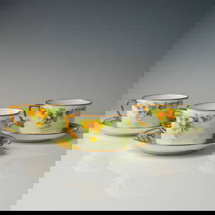 6pc Hand-Painted Yellow Floral Porcelain Cup & Saucer Trio, Austria: A charming 6-piece porcelain demitasse cups (3) and matching saucers (3), each delicately hand-painted with yellow and orange blossoms, leafy green garlands, and highlighted with gilt detailing. The c
