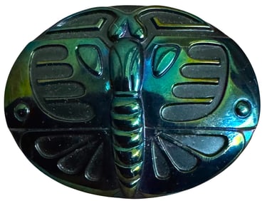 A black glass iridescent pictorial button