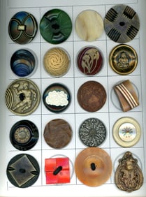 A card of assorted mostly plastic buttons