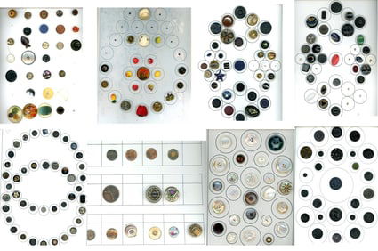 A box lot of assorted material cards of buttons
