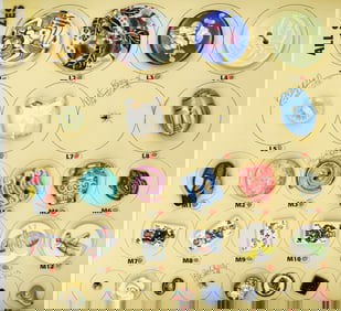 A partial card of assorted ceramic buttons
