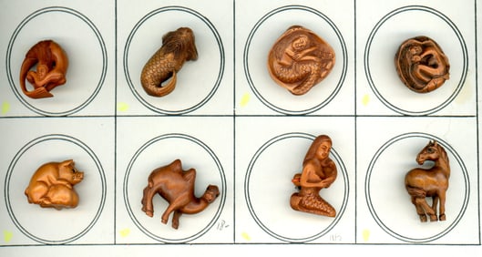 A small card of realistic Boxwood buttons