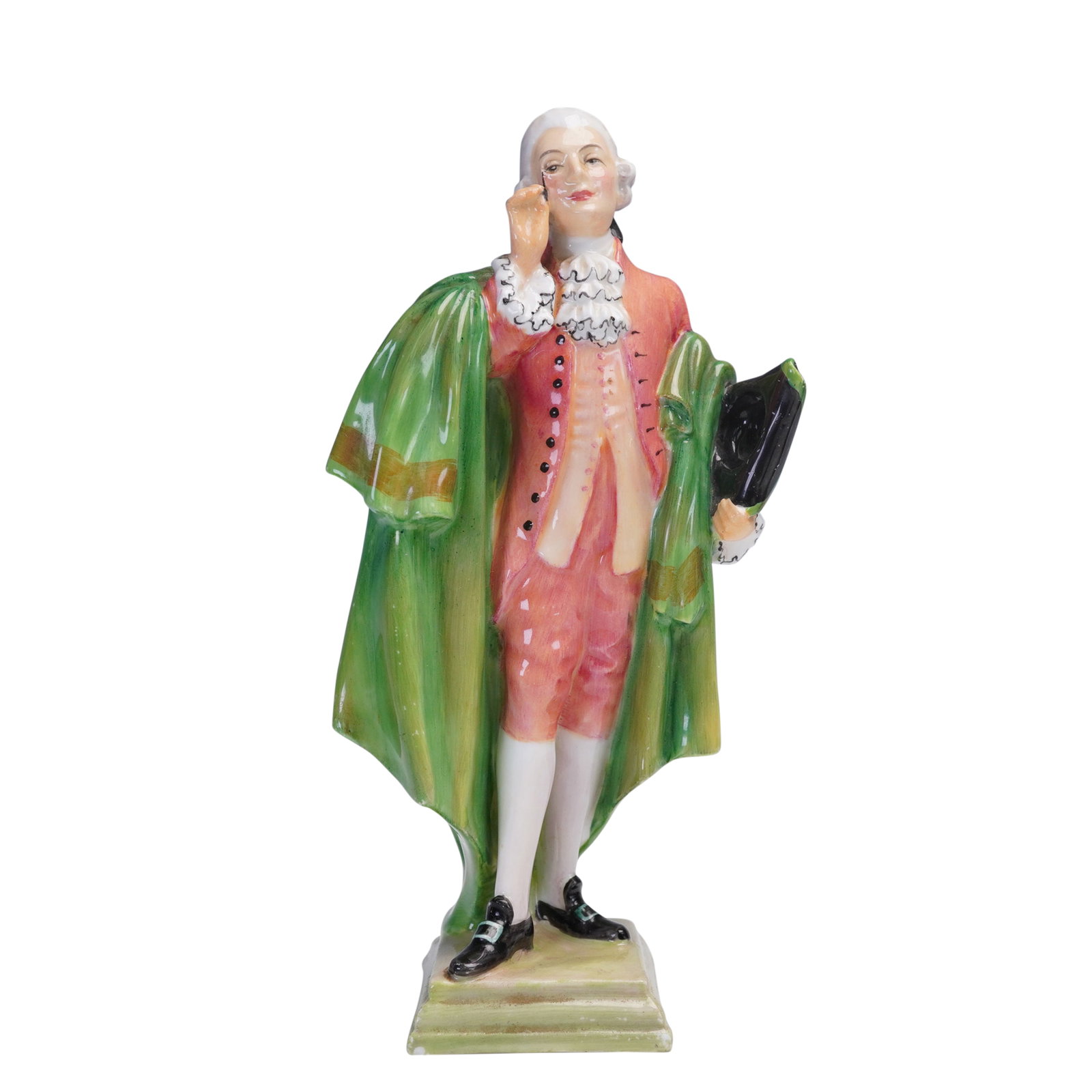 Royal Doulton Figurine The Regency Beau HN1972 by Henry Fenton: A charming Royal Doulton bone china figurine titled The Regency Beau, model HN1972, depicting a finely dressed gentleman in 18th-century attire. He is portrayed with a confident stance, wearing a cora