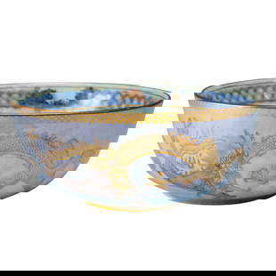 Wedgwood Fairyland Lustre Imperial Bowl, Celestial Dragon Z4829: The bowl features a decorated exterior in mottled blue lustre with three stylized dragons rendered in gold, each encircling the bowl's body in dynamic motion. The background displays pale staining and