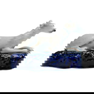 Staffordshire Pottery Inkwell Figure of a Greyhound on Cushion Base: A charming 19th-century Staffordshire pottery inkwell modeled as a recumbent greyhound. The lean hound is portrayed lying gracefully on a deep cobalt blue cushion with molded tassel details, one paw t