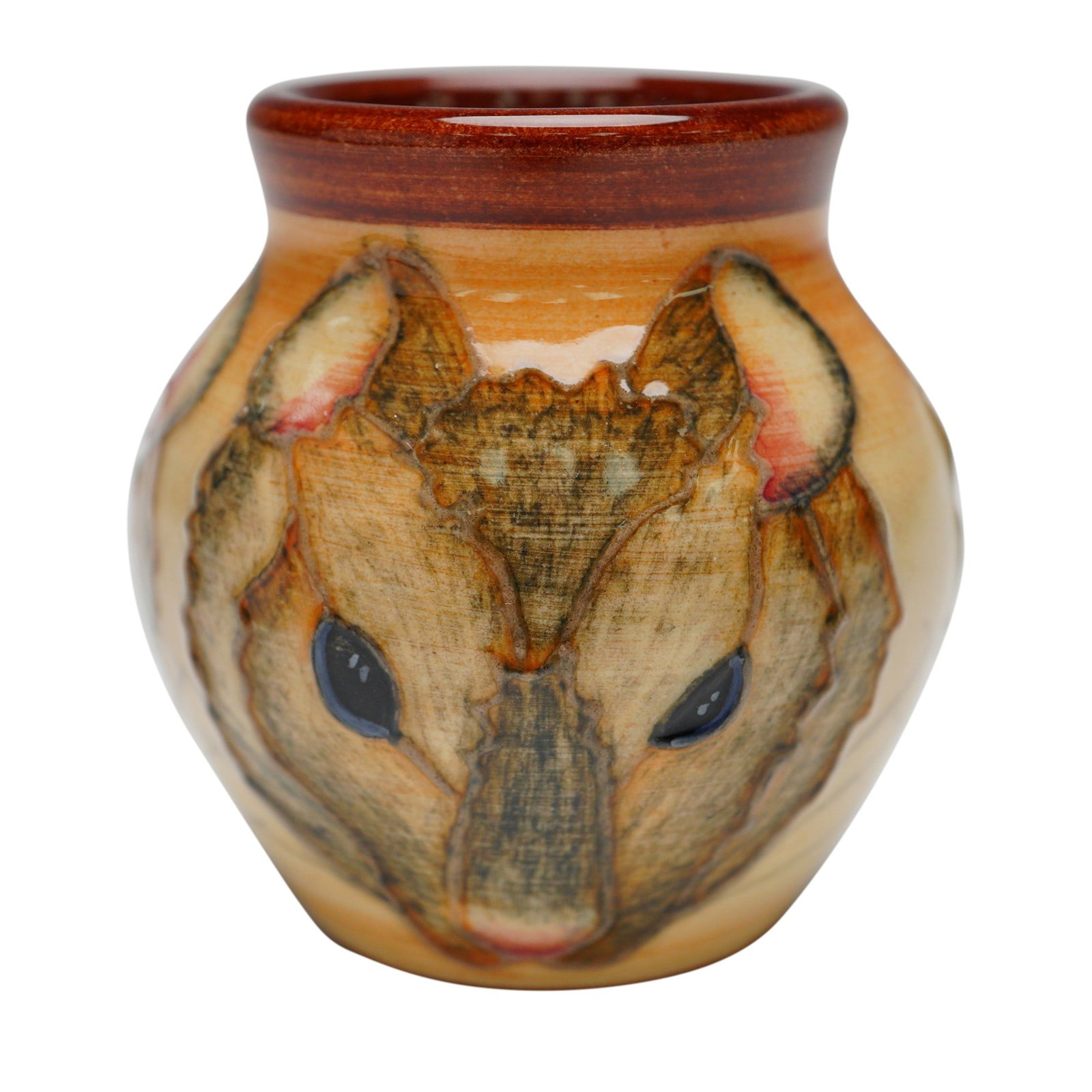 Dennis Chinaworks Pottery by Sally Tuffin Mini Mouse Vase: Handcrafted by Dennis Chinaworks, this miniature vase features a sculptural depiction of a mouse rendered in relief with expressive eyes and detailed fur patterns. The exterior is decorated with earth