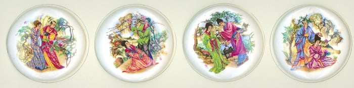 A small card of porcelain pictorial buttons