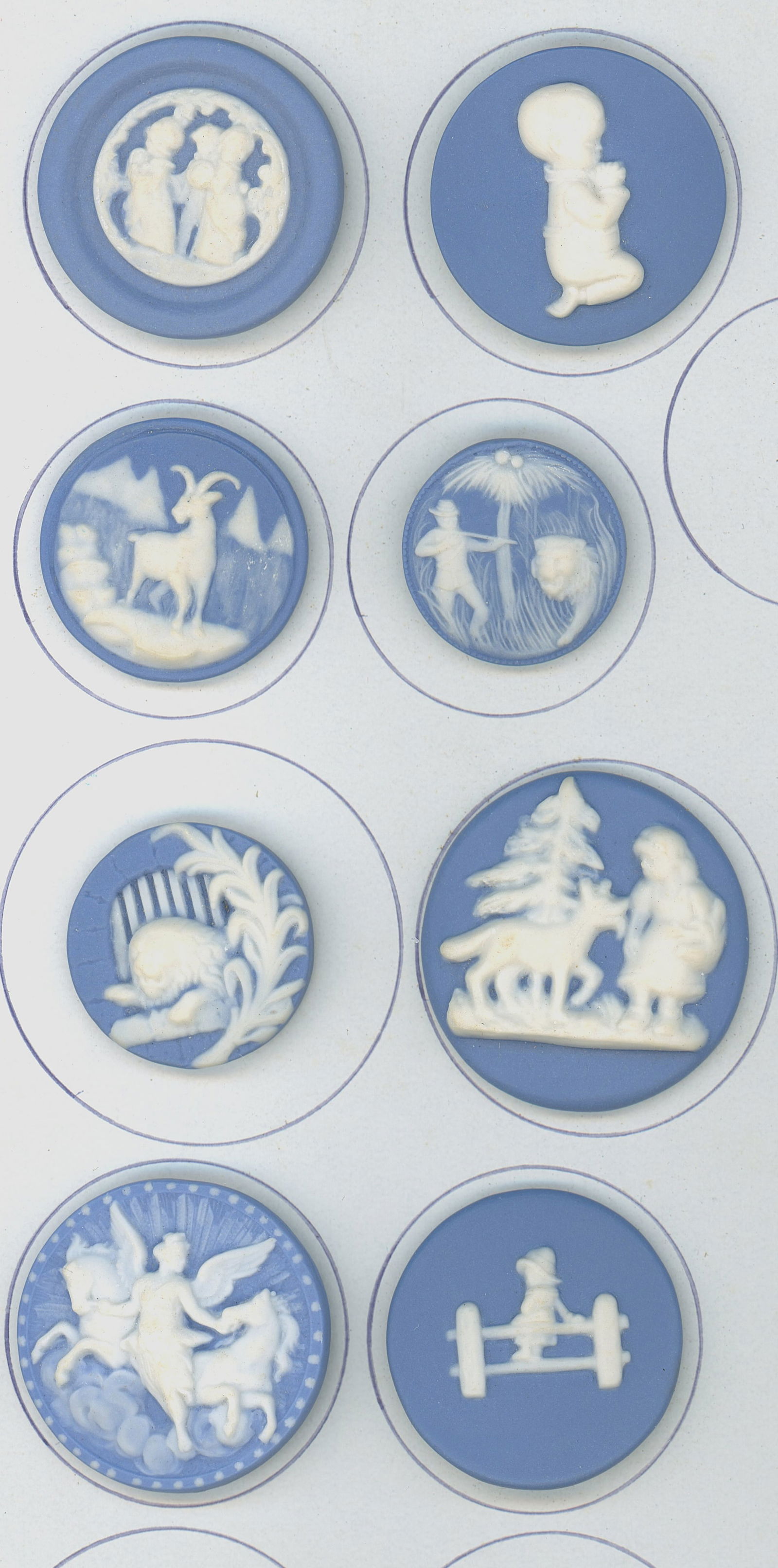 A small card of pictorial Jasperware buttons: 8 large 20th century buttons by Stella Rzanski. This lot includes several very nice examples in a variety of pictorials including Children. Issued: DIVISION 1=PRE 1918 AND DIVISION 3 IS AFTER 1918 Dim