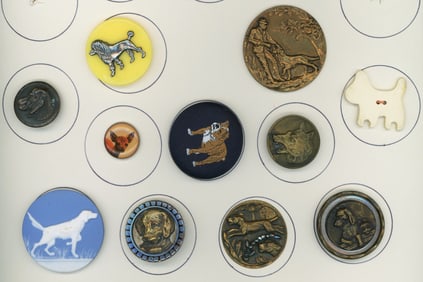 A small card of assorted Dog buttons
