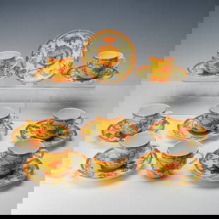 16pc Hermes La Siesta Porcelain Demitasse Cups and Saucers, Set for 8: Vibrant 16-piece set for 8 by Hermes in the La Siesta pattern. Each piece is crafted of fine porcelain and decorated with bright yellow and orange floral and vine motifs, accented with butterflies and
