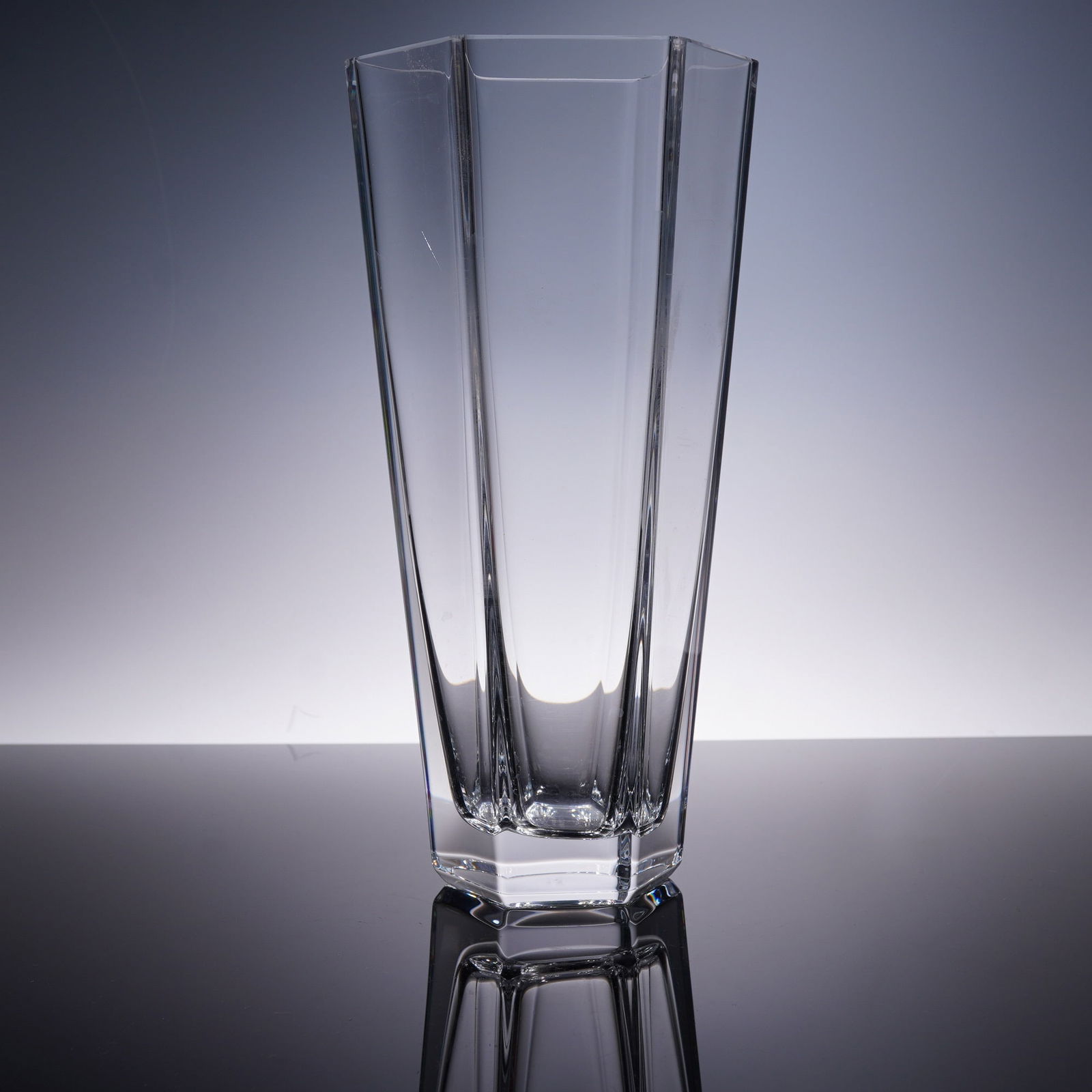 Tiffany and Co. Crystal Vase Frank Lloyd Wright: Tiffany and Co. crystal vase designed in collaboration with the Frank Lloyd Wright Foundation. This sculptural piece features a bold hexagonal form with deep vertical panels, reflecting Wright's signa