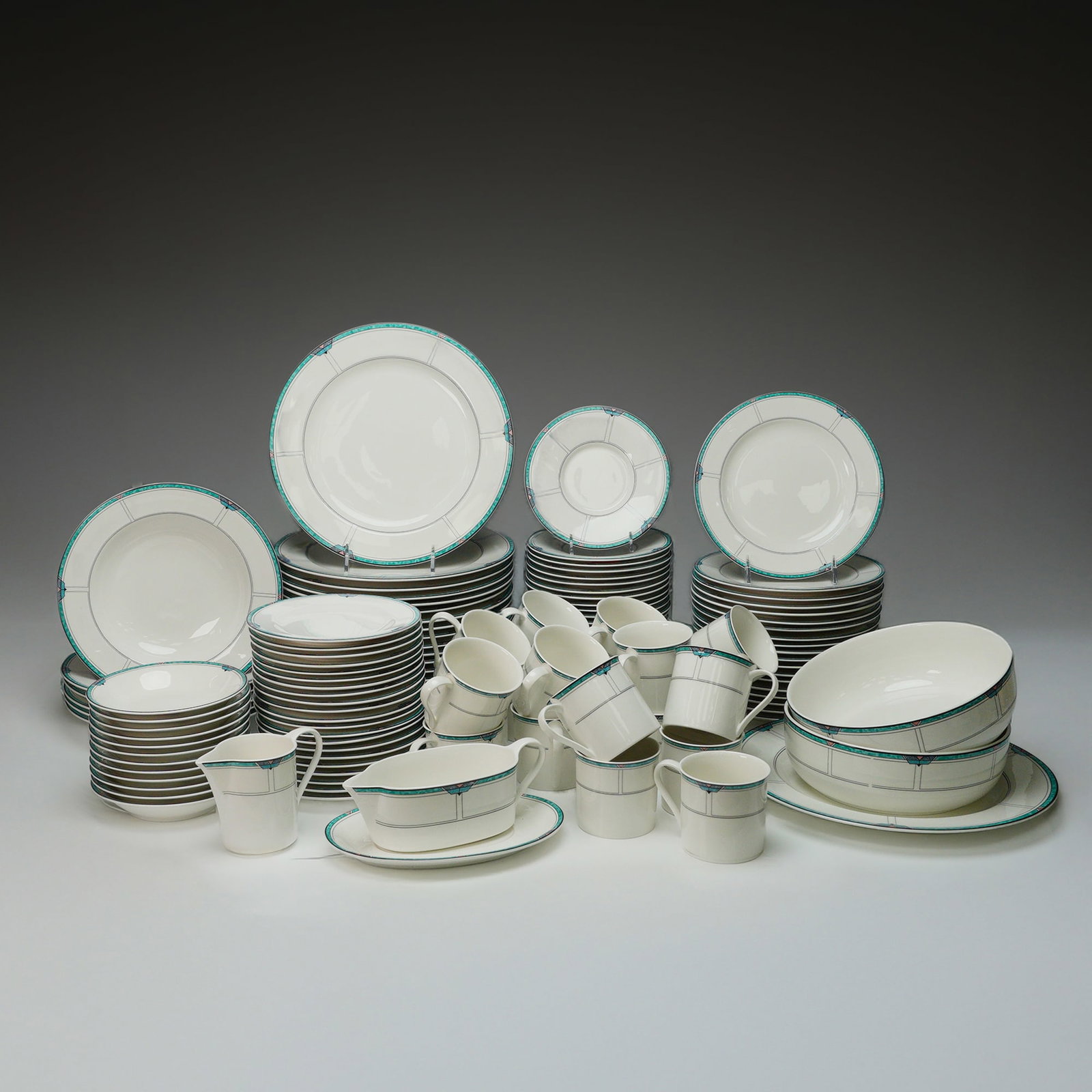 127pc Mikasa Maxima Fine China Dinner Service for Twelve Plus, Emerald Cove: An extensive 127-piece dinner service by Mikasa in the Maxima line, pattern CAK45 Emerald Cove. This striking set features crisp white fine china decorated with a Deco-inspired border of jade green, b