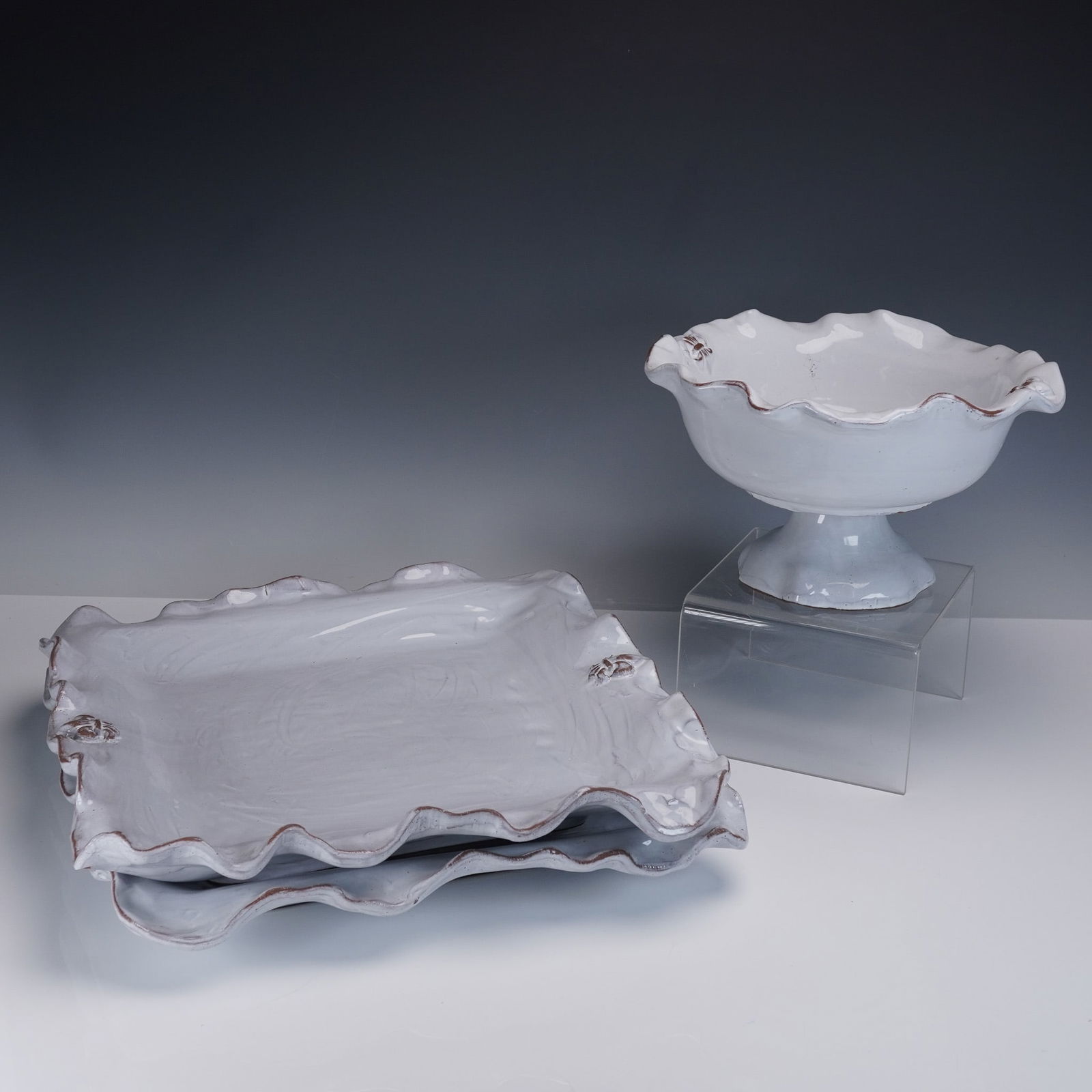 3pc Ceramic Serveware Set, Fleur de Lis by Abigails Italy: A charming 3-piece Italian ceramic serveware set by Abigails, featuring an elegant Fleur de Lis relief design and scalloped rims with rustic hand-glazed edges. This grouping includes a footed bowl and