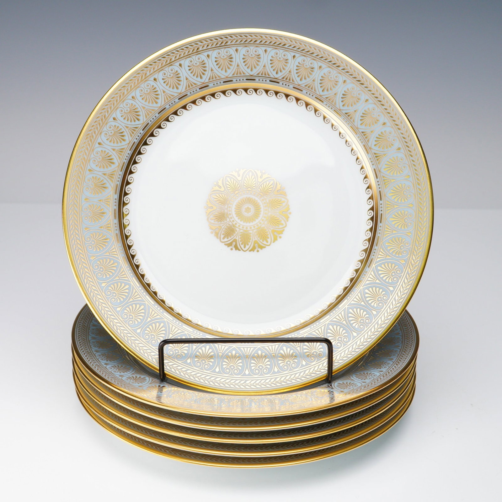 6pc Royale France Salad Plates, Elysee: Set of six porcelain salad plates by Royale, in the Elysee decor. Each plate features a central gold medallion and a richly detailed neoclassical border in gilt. This pattern is a reissue of the origi