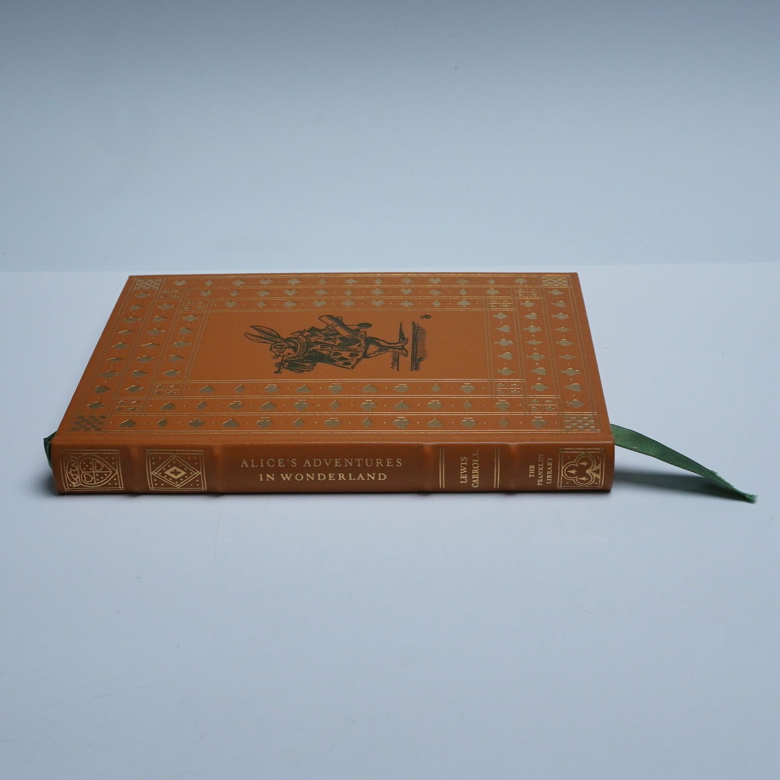 Lewis Carroll Franklin Library Hardcopy Book Alice's Adventures 1975: Franklin Library limited edition printing of Alice's Adventures in Wonderland by Lewis Carroll, with illustrations by John Tenniel. Published in 1975 by the Franklin Library in Franklin Center, Pennsy