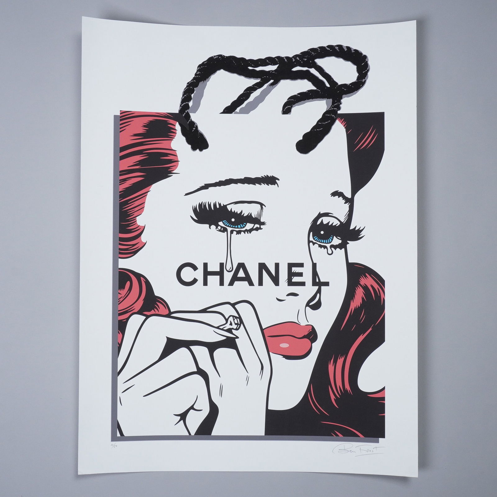 Ben Frost Limited Edition Print, Fashion Victim: Ben Frost's Chanel Girl is a striking commentary on consumer culture, blending pop art aesthetics with high-fashion iconography. This limited edition print, numbered 4 of 50, features Frost's signatur