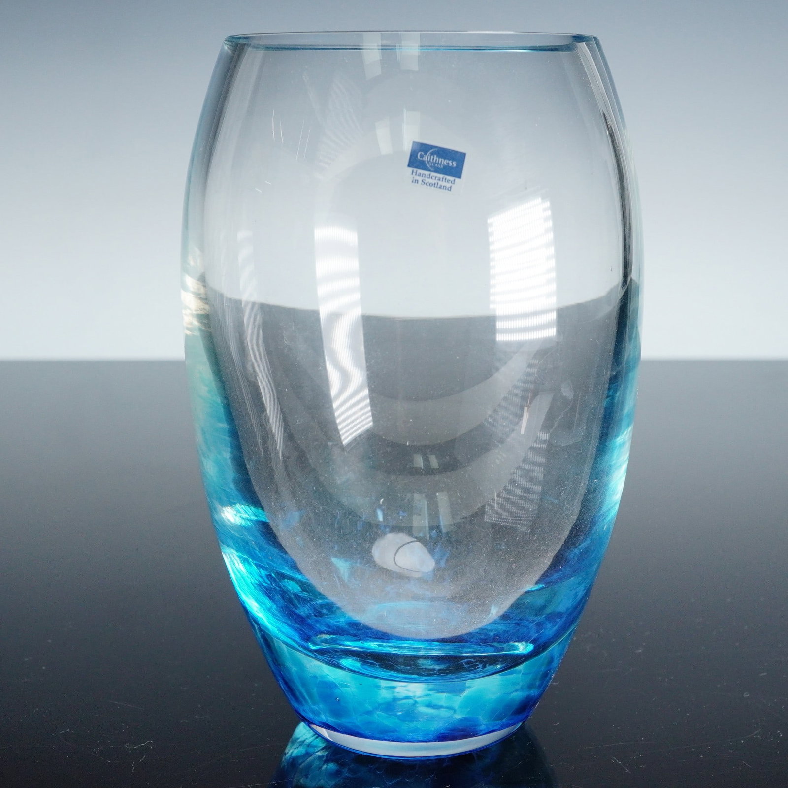 Caithness Mosaic Barrel Vase 8133 Handcrafted in Scotland: Caithness Glass Mosaic Barrel Vase number 8133 featuring vibrant blue mottled colorwork transitioning into clear glass. Etched Caithness mark on base and original sticker intact. Includes original box