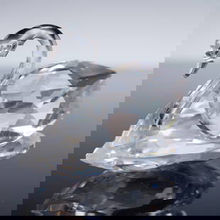 Swarovski Crystal Figurine, Swan: Elegant Swarovski crystal figurine in the form of a swan, featuring a clear faceted body with smooth neck and head detail. The precision-cut facets reflect light beautifully, showcasing Swarovski's re