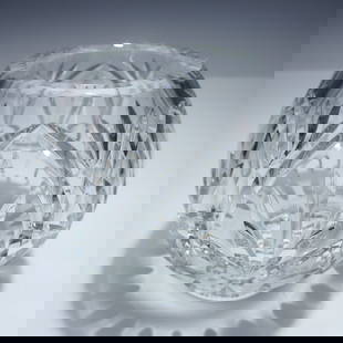 Cut Crystal Rose Bowl Vase: A cut crystal rose bowl with a rounded, bulbous form, crafted from clear, heavy crystal. The bowl features a symmetrical fan cut pattern radiating around the body, highlighted by deep vertical and cro
