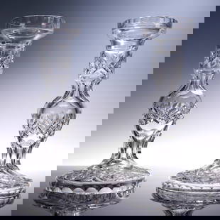 Pair of Waterford Crystal, Tall Single Light Candlesticks: Elegant pair of tall single light candlesticks, expertly crafted in fine Waterford crystal. Each candlestick features a faceted knop stem with diamond and fan cut patterns, gracefully tapering to a wi