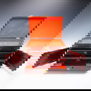 Chinese Rosewood Jewelry Chest with Brass Mounts: Chinese rosewood jewelry chest with decorative etched brass fittings, including corner mounts, floral hinges, and an elaborate front clasp. The rectangular case opens to reveal a fitted interior lined