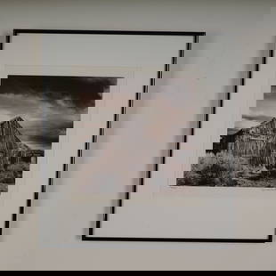 James A Swallow, B&W Photograph, Waiting till the Next, Signed: A striking limited edition black and white photograph by James A. Swallow, titled Waiting Till the Next. This atmospheric image captures a weathered wooden structure beneath dramatic skies in a desola