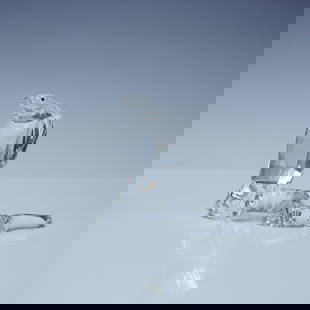 Swarovski Silver Crystal Figurine, Cobra Snake: This Swarovski Silver Crystal Cobra Snake figurine is intricately crafted with clear precision-cut crystal, capturing the cobra in a striking pose with its hood flared and body coiled. The detailed fe