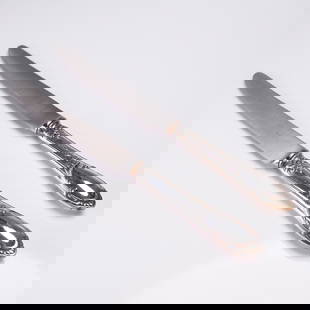 2pc Buccellati Sterling Silver Fruit Knives, Monte Mario Pattern: Pair of gorgeous sterling silver-handled fruit knives in the lovely Monte Mario pattern by Buccellati, introduced in 1996. Each knife features a finely detailed floral and scroll motif with a smooth b