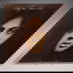 Columbia Records Billy Joel Vinyl Record, Piano Man: A classic Columbia Records vinyl LP pressing of Billy Joel's seminal studio album "Piano Man." The cover features an evocative portrait rendered in a photorealistic and surrealist fusion, with Joel's