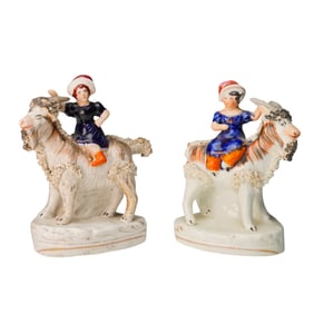 Pair of Staffordshire Pottery Goat Rider Figurines