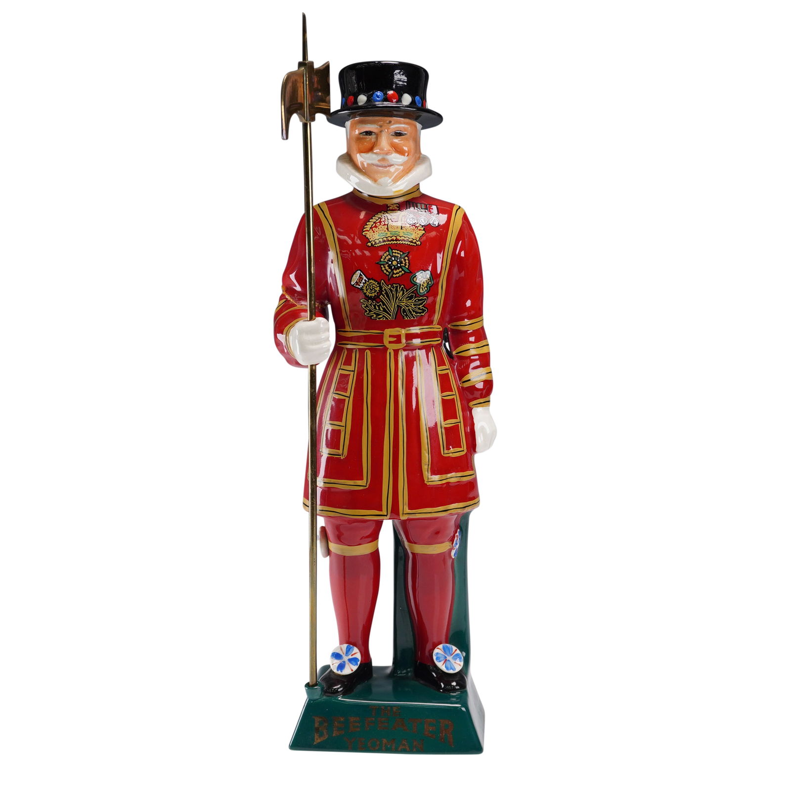 Carlton Ware Figurine, The Yeoman Beefeater: A large and striking Carlton Ware Beefeater Yeoman figurine, hand painted in rich glossy enamels with vibrant red, black, gold and multicoloured accents. The figure depicts a traditional Yeoman Warder