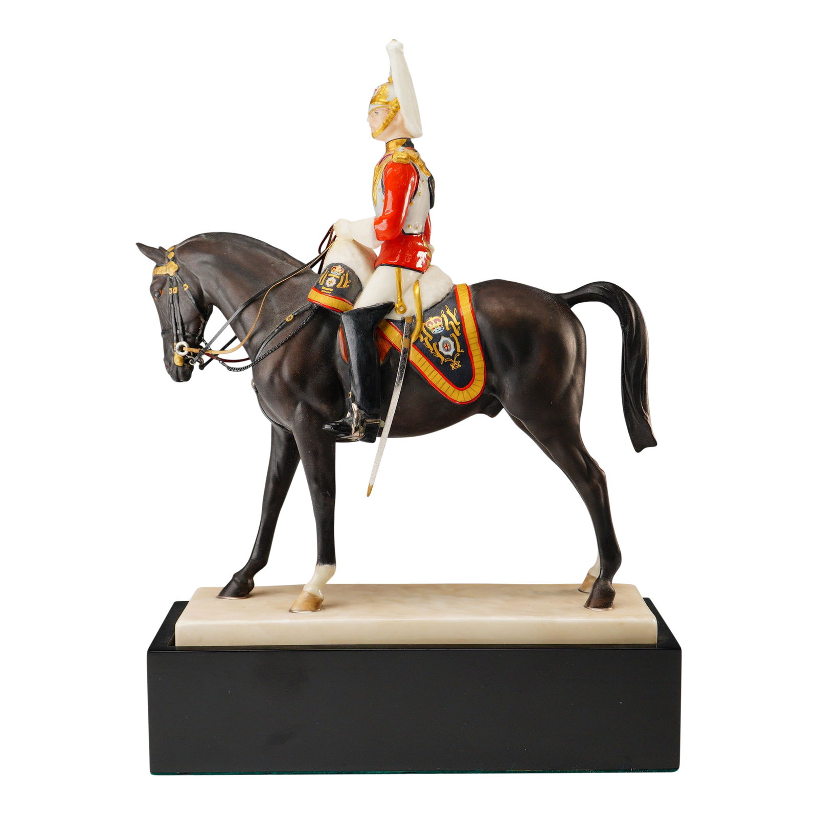 2pc Royal Worcester Figurine with Base, The Life Guards: Detailed figure set crafted by Royal Worcester in fine bone china, hand painted and modelled by Doris Lindner. The composition features a mounted member of the British Household Cavalry Regiment, know