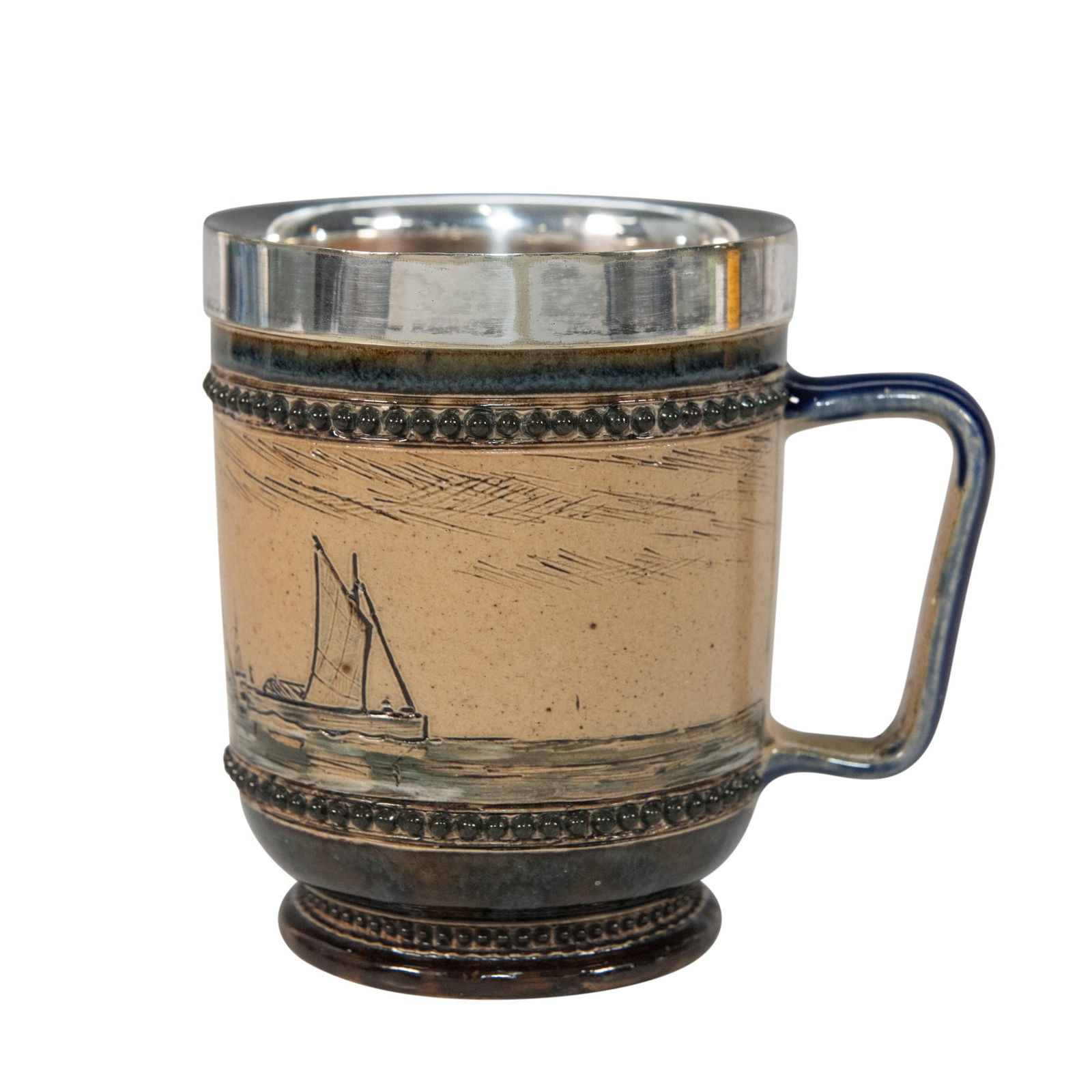 Antique Doulton Lambeth Stoneware Maritime Mug: Hand decorated single-handle mug in blue and brown glaze. Features an incised scene of several ships with painted sails in open water. Decorated with a silver rim. Doulton Lambeth impressed stamp. Art
