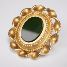 Gold-Tone Twisted Ribbon Brooch with Green Cabochon