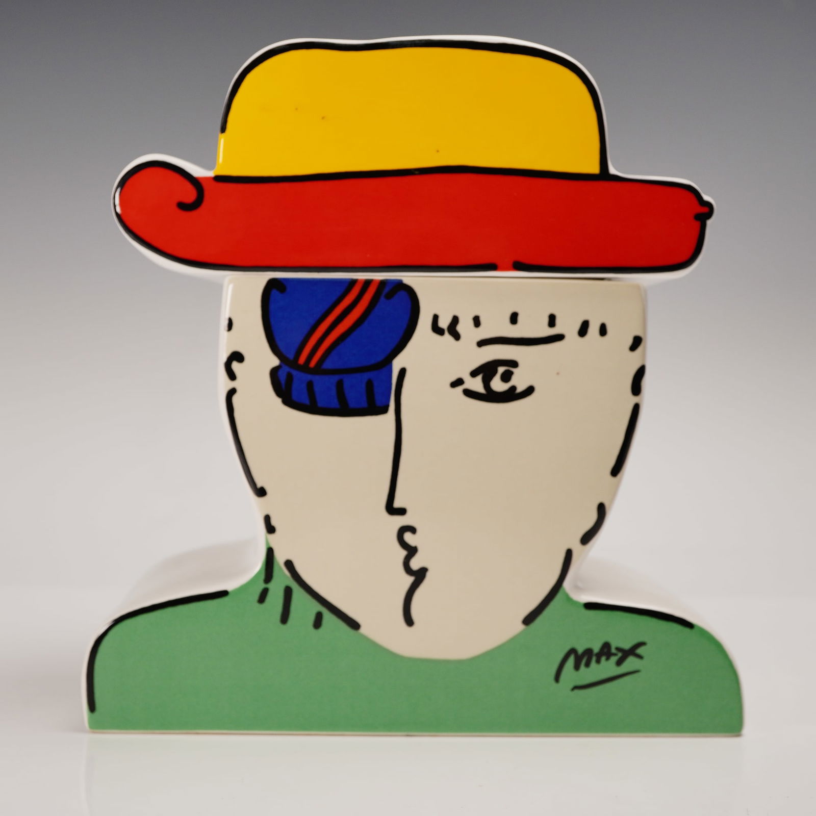 2pc Peter Max Cookie Jar Ceramic Head Design 1989 Japan: Two-piece ceramic cookie jar featuring a bold, stylized head design by Peter Max, dated 1989 and marked Made in Japan on the base. The brightly colored pop art-style face includes a red and yellow hat