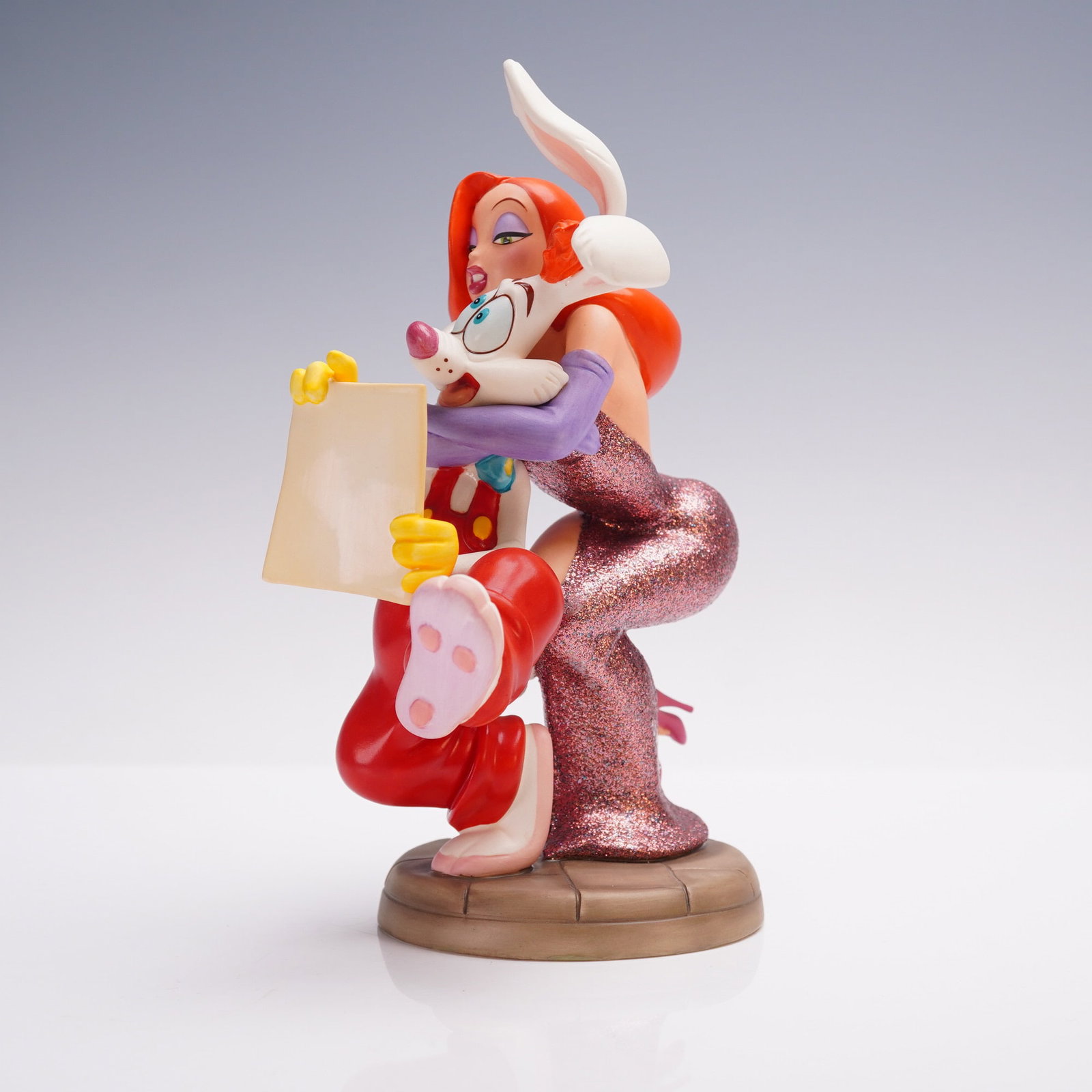 Walt Disney Classics Figurine Roger & Jessica Rabbit: From the Walt Disney Classics Collection, this figurine features Roger and Jessica Rabbit in a charming pose from the animated film Who Framed Roger Rabbit. Titled Dear Jessica, How Do I Love Thee?, t
