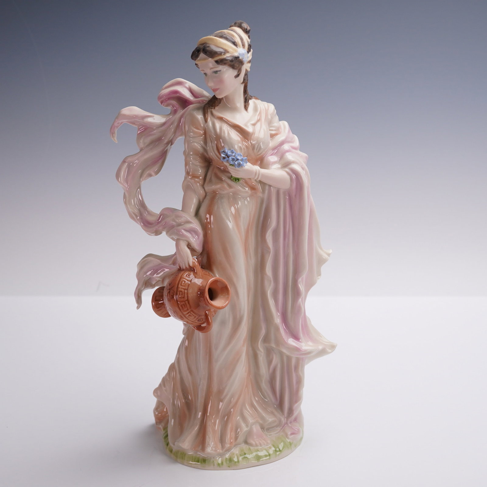 Wedgwood Porcelain Classical Collection Figurine, Winsome: A graceful porcelain figurine titled Winsome from the Wedgwood Classical Collection, dated 1996. Hand-decorated and modelled by Jenny Oliver, this English-made figure depicts a classically robed maide