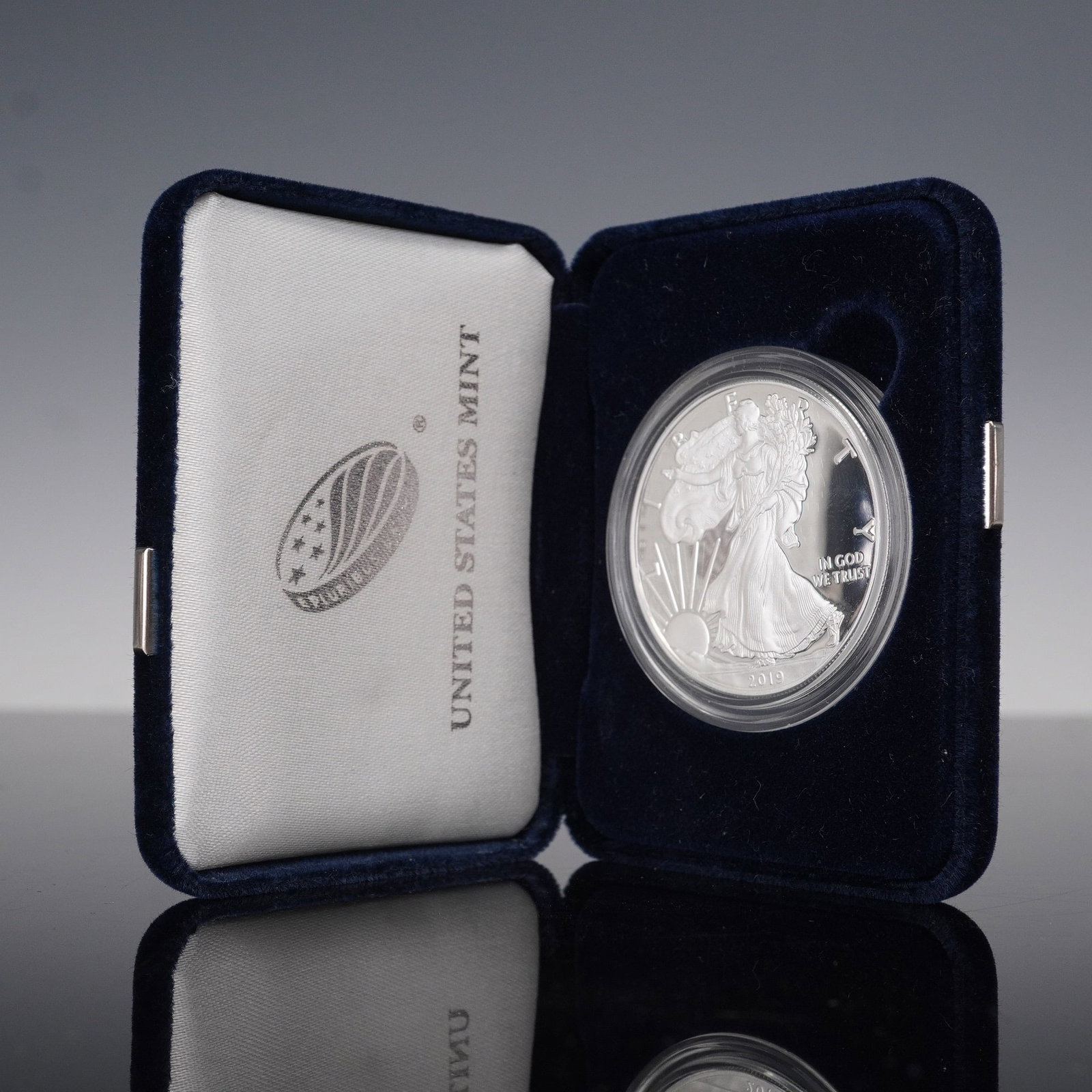 2019-W US 1oz Silver Eagle Proof OGP: 2019-W American Silver Eagle One Ounce Proof Coin produced by the United States Mint. The obverse features the Walking Liberty design by Adolph A. Weinman, showcasing a full-length image of Liberty in