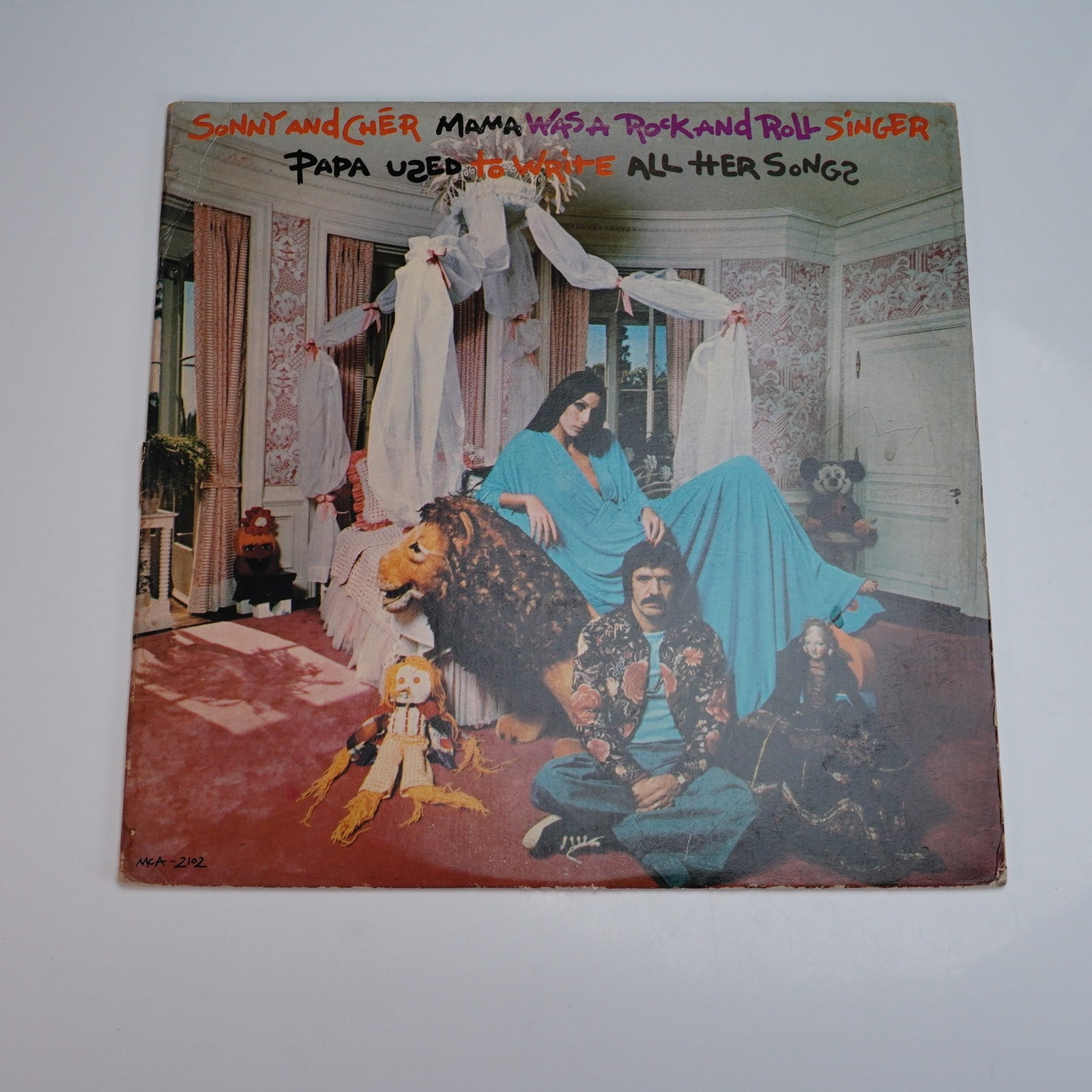 MCA Records Sonny & Cher Vinyl LP Record: This 12-inch vinyl record presents Sonny and Cher's final studio album together, titled "Mama Was a Rock and Roll Singer Papa Used to Write All Her Songs," released in 1973 by MCA Records. The album c